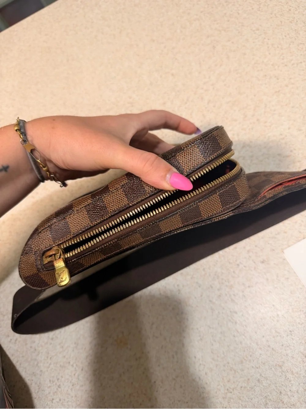 Authentic Louis Vuitton -  Ebene Geronimos Sling